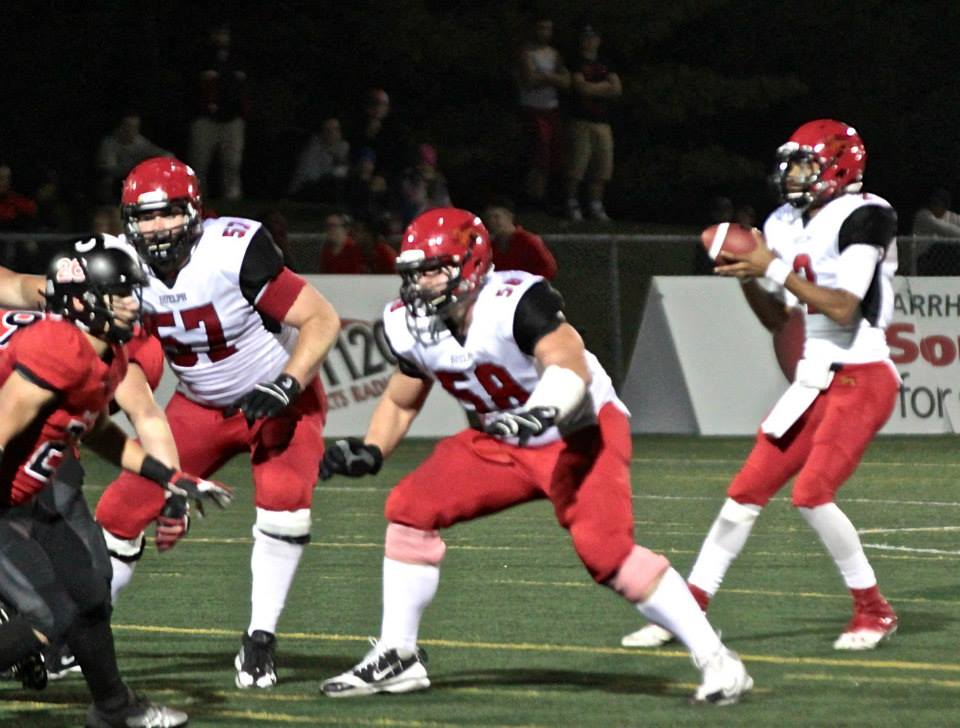 well protected Jazz Lindsey drops back to pass vs Carleton Photo    oua football blog
